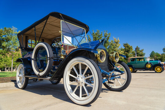 Front side view of a vintage 1911 Cadillac 30 Touring classic car in Westlake, Texas.