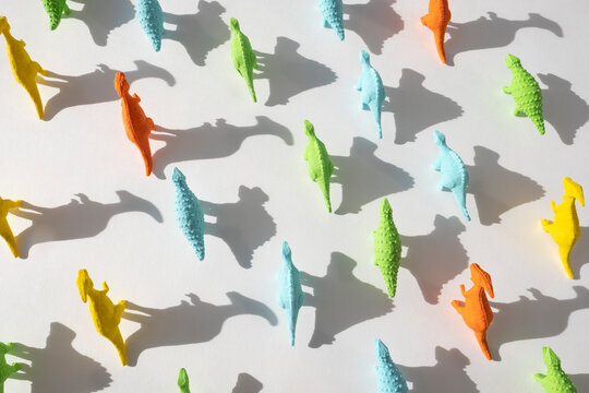 Toy Dinosaurs and their shadows