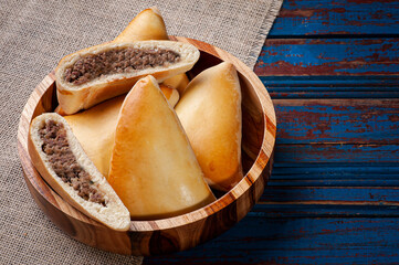 .Meat sfiha. Typical Arabic dish that has been adapted for Brazilian cuisine. Copy space.