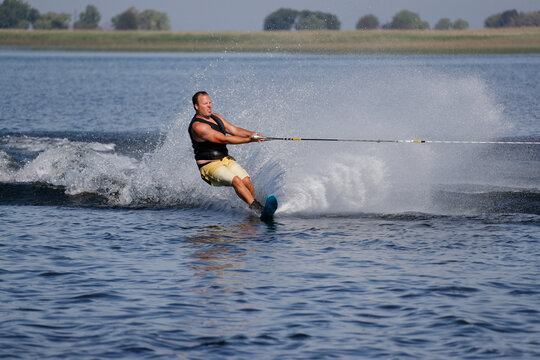 waterskiing on a lake