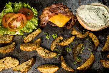 Tasty burger on rustic background