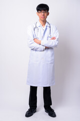 Portrait of young handsome Asian man doctor