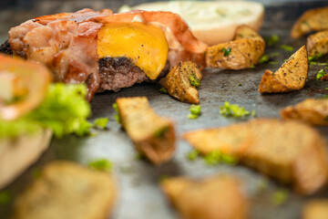 Tasty burger on rustic background
