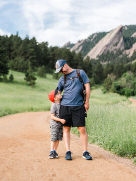 Father and son on trail in Colorado