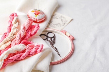 Embroidery set. Linen fabric, embroidery patterns, embroidery hoop, colorful threads and needls.