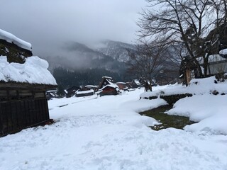 Fototapeta na wymiar snow covered house in mountains