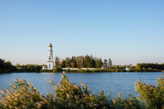 Orthodox bell tower and lake