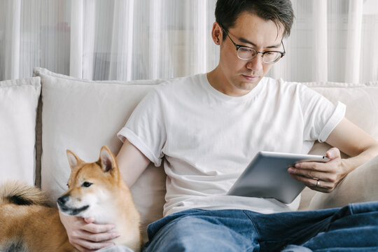 Man sitting with his dog