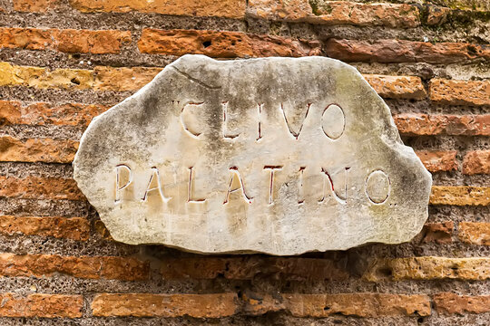 An ancient tablet of ancient times on on which in Latin is written Clivo Palatino - the name of the ancient road in Rome to the Palatine Hill. close-up