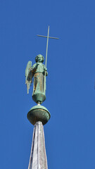 Angel with a cross on the spire of the cathedral