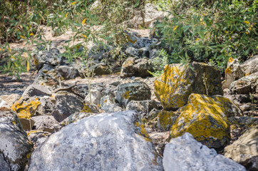 Rocks of volcanic origin on the beach of the island of Lihada-Greece 
