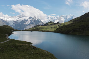 Fototapeta na wymiar Bachalpsee close to Grindelwald. Eiger and Jungfrau in the background.