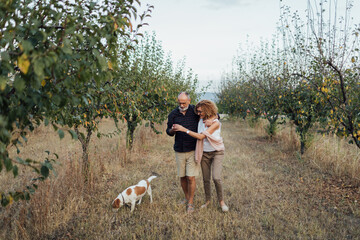 Senior Couple In The Orchard