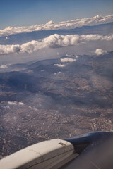 Fototapeta na wymiar City view from the window of an airplane