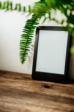 Ebook with copy space on a wooden desk