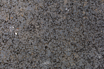 texture of wet black asphalt