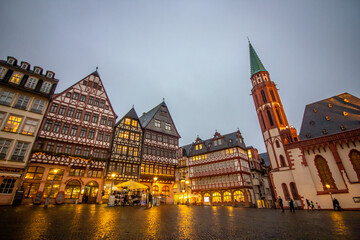 Naklejka premium Medieval historical buildings at old town square Römerberg in Frankfurt, Germany.
