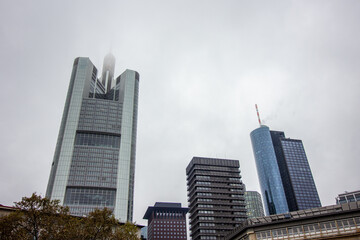 Fototapeta na wymiar Frankfurt skyscraper buildings for business and finance at a rainy and cloudy day