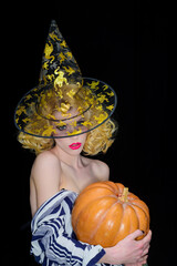 Sensual girl with Pumpkin. Trick or treat. Happy Halloween. Halloween concept. Halloween Party...