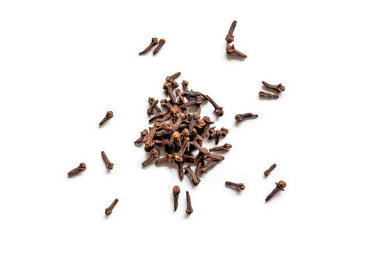 top view of a pile of organic cloves isolated on a white background
