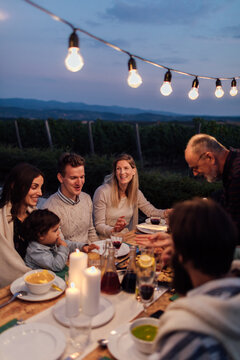 Middle-Aged Man Carves Up Roasted Turkey