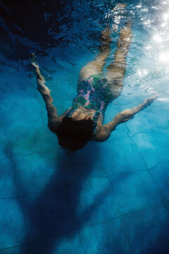 Beautiful woman swim in pool