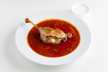 Traditional Ukrainian Russian borscht with duck leg