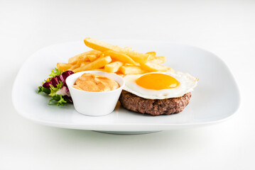 cutlet with egg and french fries