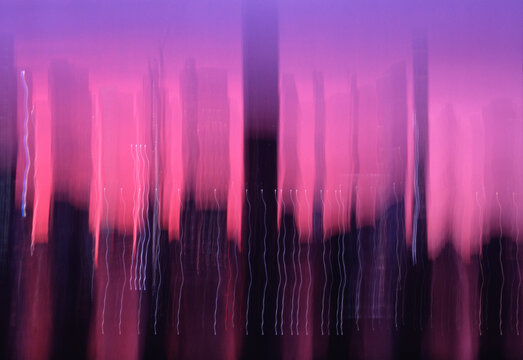 Blurred buildings at sunset