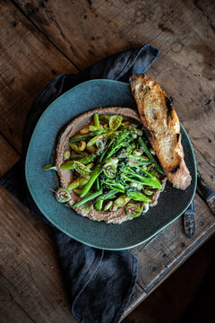 Hummus with asparragus, bimi, green beans and herbs