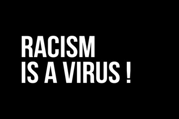Racism is a virus. White text on black background representing the need to stop racism