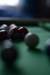 billiard balls on a green table