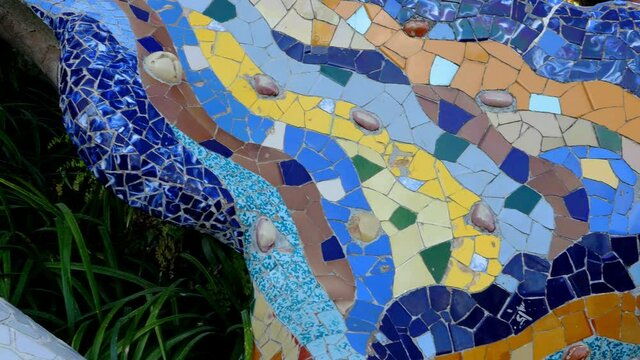 Details with Ceramic tiles in Antoni Gaudi's Park Guell, Barcelona, Spain