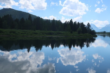 Reflective lake water with Mount Moran