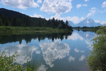 Reflective lake water in Tetons National Park in Wyoming