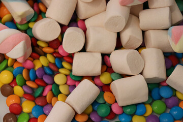 Different sweets decorating a beautiful party table.