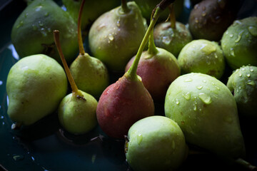 pears on the plate on an aged table	