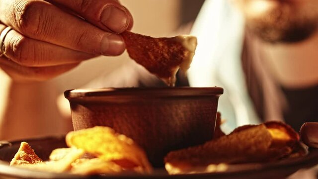 eating nachos close-up