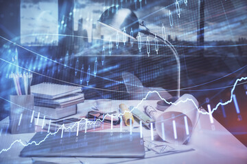 Double exposure of stock market graph drawing and office interior background. Concept of financial analysis.