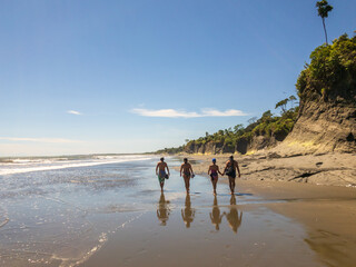 people walking on the beach