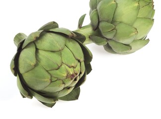 Obraz premium ARTICHOKES AGAINST WHITE BACKGROUND