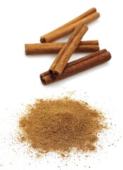 CINNAMON BARK AND POWDER cinnamomum zeylanicum AGAINST WHITE BACKGROUND