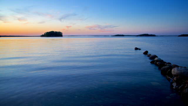 Water Reflection of the lake at twilight.  Gravenhurst, Ontario, Canada.