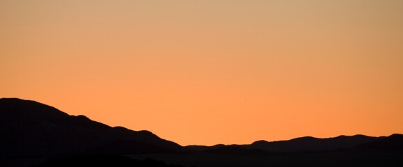 SUNSET IN NAMIB-NAUKLUFT PARK IN NAMIBIA