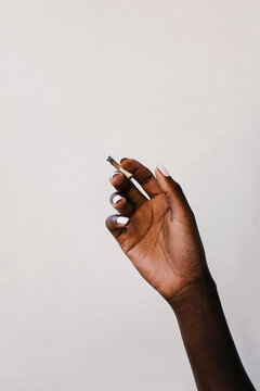 Closeup of Black Woman Holding Joint