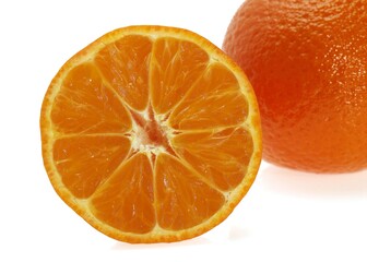 CLEMENTINE FRUIT citrus reticulata AGAINST WHITE BACKGROUND
