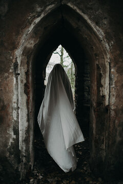 Ghost moving in arch of abandoned building