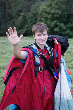 BASE jumper in wingsuit after landing