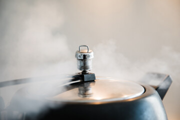 Pressure Cooker whistling off.