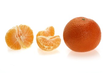 CLEMENTINE FRUIT citrus reticulata AGAINST WHITE BACKGROUND